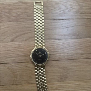 Vintage Mens Givenchy Paris Watch Gold Tone Stainless Black Dial - Picture 1 of 2
