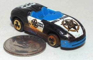 Small Mini Hot Wheels Police car in Black and White marked Roll Patrol (Worn) - Picture 1 of 3