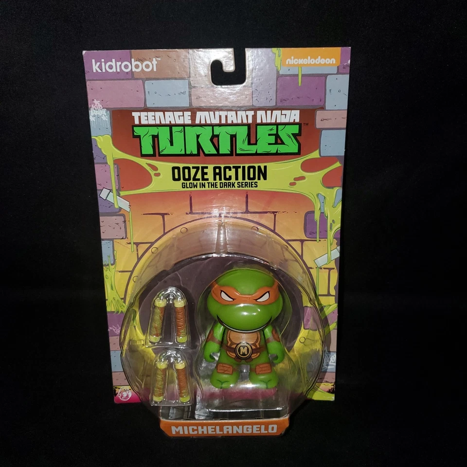 Kidrobot Teenage Mutant Ninja Turtles Michelangelo Ooze Acción Brilla en la Oscuridad Foto 1 de 1