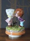 Vintage Rotating Music Box of a Girl and Boy Kissing to Love Story Tune