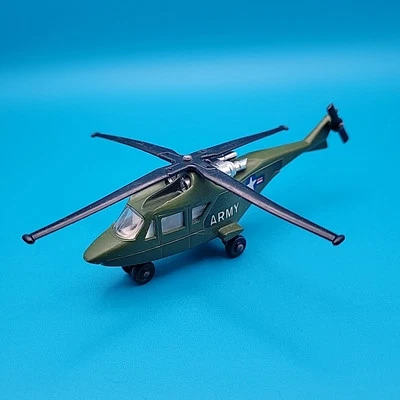 Helicóptero Sky Buster SB20 1976 del ejército de Estados Unidos caja de cerillas avión fundido a presión verde oliva Foto 1 de 3
