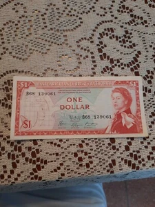 East Caribbean States  1 Dollar  Note P-13m  AU - Picture 1 of 6