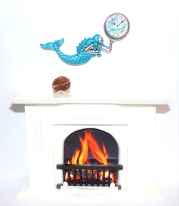 Casa de muñecas miniaturas reloj de pared sirena náutico escala 1:12 azul mediados de siglo nuevo - Imagen 1 de 8