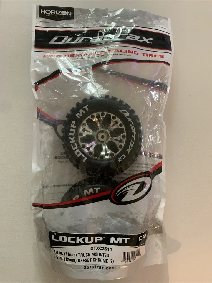 Duratrax Lockup MT C2 Pre-Assembled Chrome Wheel/Black Tire FT/RR DTXC3511 NEW - Image 1 of 4