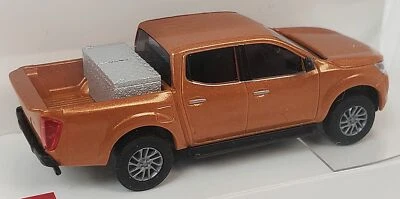 Busch NEW HO 1/87 Scale Nissan Frontier Pick-Up Truck in Gold Metallic Finish - Image 1 of 4