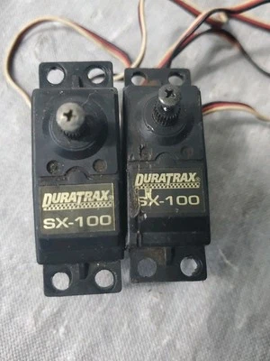 RC Lot 2 Duratrax Sx-100 Servos - Image 1 of 4
