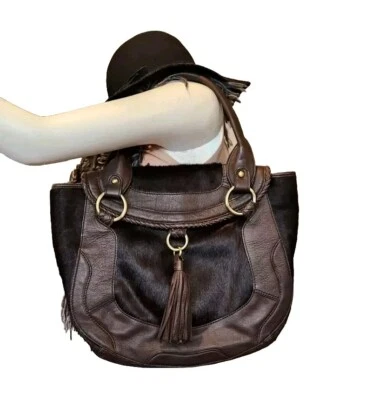 Bolso Cartera Kate Landry Cabello de Becerro y Cuero Marrón Borla Foto 1 de 4