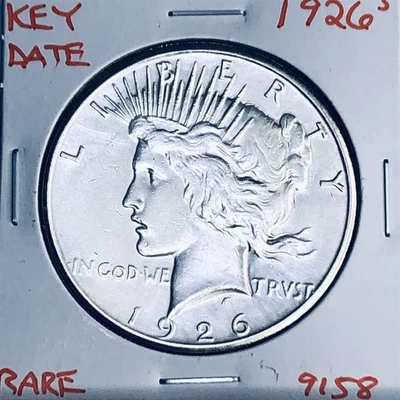 1926 S PAZ DÓLAR DE PLATA ALTA CALIDAD GENUINO EE. UU. COMO NUEVO RARA MONEDA CLAVE 9158 Foto 1 de 3