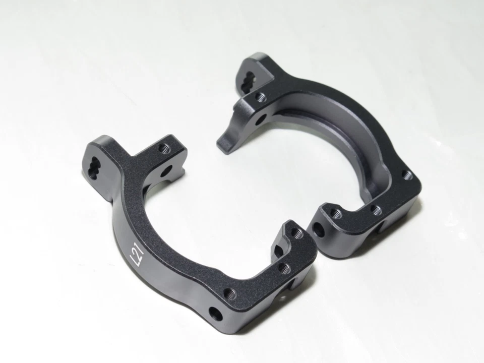 TKR9005 TEKNO EB48 2.2 BUGGY 21DEG ALUMINUM CARRIERS - Image 1 of 1