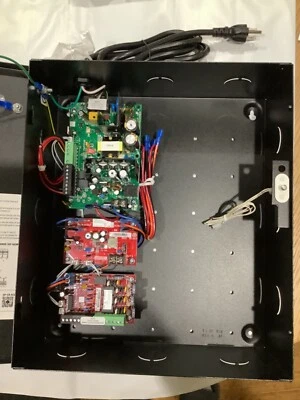 Fuente de alimentación AVIGILON LifeSafety OP-ECL1-PS1224.  Módulo FPV4, C4, módulo B100 Foto 1 de 4