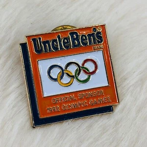 Prendedor de intercambio de solapa de recuerdo de los Juegos Olímpicos de Barcelona 1992 marca arroz tío Bens - Imagen 1 de 2
