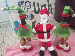 Weltmarkt Weihnachtsmann und seine Elfen Weinflaschen Outfits - Bild 1 von 4