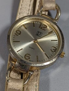 NYC Gold Tone Dial Round Case Beige Faux Leather Band Watch 6.75 Inch - Picture 1 of 7