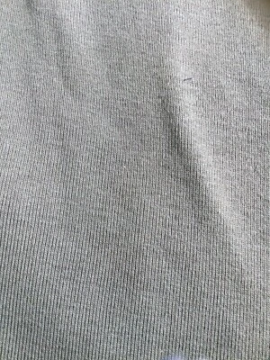 Green ribbed stretch knit fabric 62 inches wide by 2 yd. 17 inches - Image 1 of 3