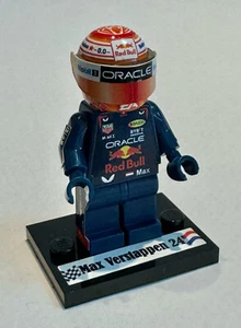 Minifigure F1 Max Verstappen World Champion 2024 ORANGE TRIBUTE GP BARCELLONA - Picture 1 of 2