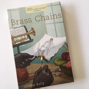 Brass Chains by Donna Kelly ANNIE’S MYSTERIES UNRAVELED # 5 Cozy Crochet Mystery - Picture 1 of 2