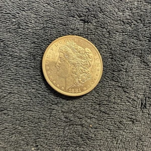1881 O $1 Morgan Silver Dollar - Picture 1 of 4