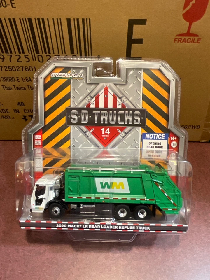 Greenlight  SD TRUCKS 2020 Mack LR Rear Loader Waste Management  - Image 1 of 1