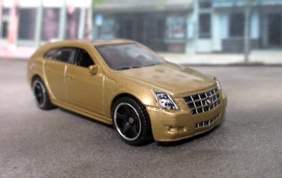 Matchbox 2010 Cadillac CTS Wagon in Gold  Loose  1:67 scale diecast - Image 1 of 4