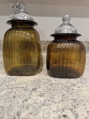 Juego de 2 frascos de vidrio pesado ámbar Artland vintage años 70 boticario  Foto 1 de 4