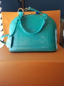 turquoise louis vuitton bolsa