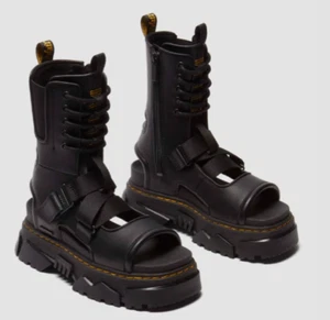 Dr. Martens 40885001 VIRGINIA_TUMBLED_STRETCH_PU_MATTISON_GLDTR_BLACK Limited - Foto 1 di 10