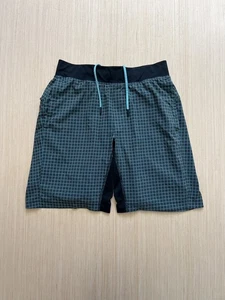 Pantalones cortos para hombre Lululemon T.H.E. Patrón de rejilla verde azulado forrado doble talla mediana - Imagen 1 de 20