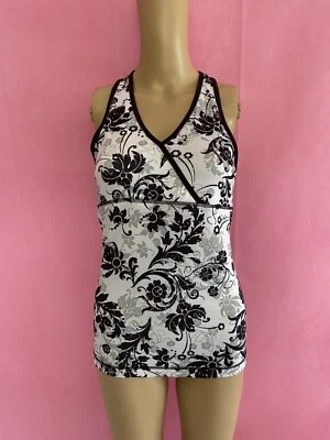 Regata Danskin now preta/branca floral gola redonda S(4/6) - Imagem 1 de 3