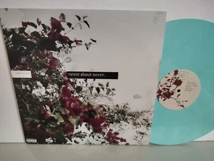 NEVER SHOUT NEVER. - "WHAT IS LOVE?" / TEAL COLORED VINYL / LOVEWAY RECORDS 2010 - Picture 1 of 4