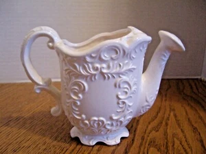 VINTAGE PORCELAIN FOOTED WATERING CAN w/EMBOSSED DESIGN ~ CREAM ON CREAM COLOR - - Picture 1 of 11