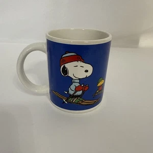 Christmas Coffee Mug Tea Cup - Blue - Peanuts Snoopy and Woodstock on Skis - Picture 1 of 2