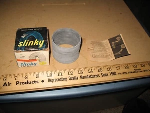 VINTAGE METAL SLINKY IN BOX WITH INSTRUCTIONS 1970s 60s CHILDHOOD TOY DECOR - Picture 1 of 5