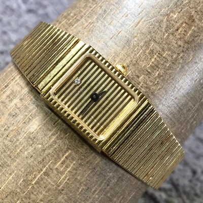 Croton Reloj analógico de cuarzo en tono dorado con acento de diamante para mujer de 17mm 6 1/4" Foto 1 de 4