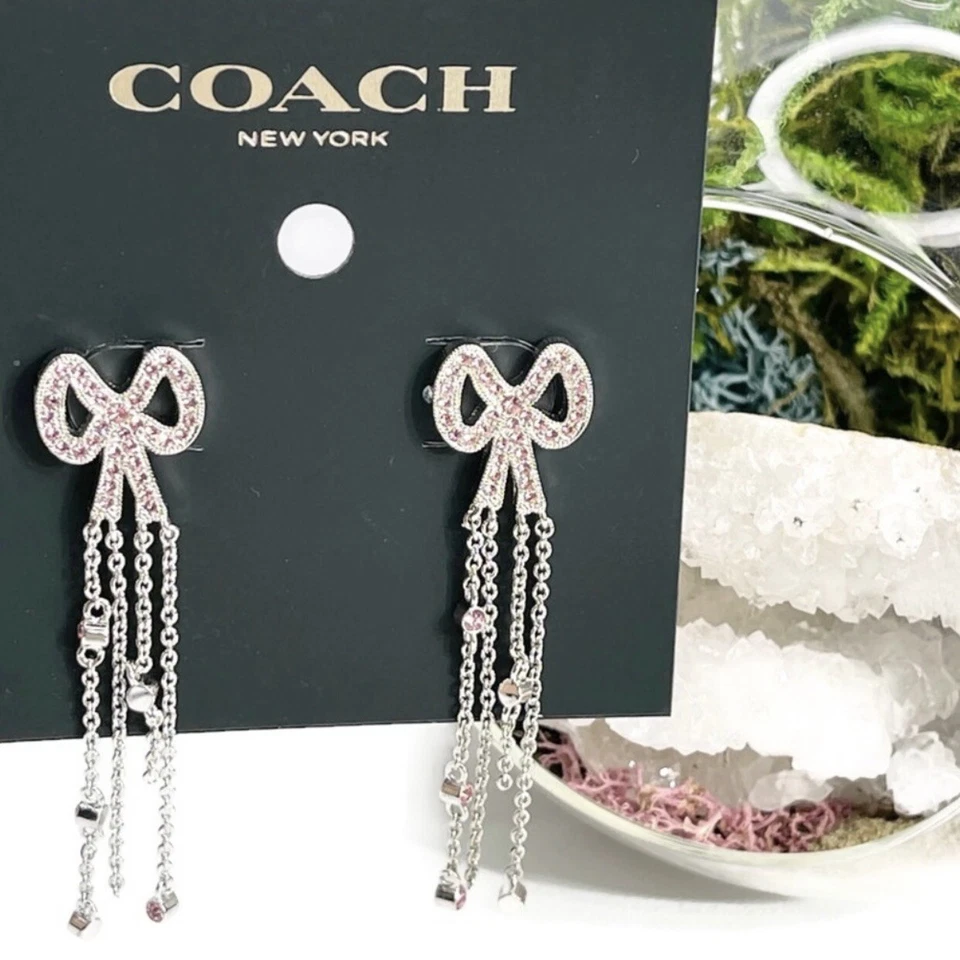 COACH Pink Pave Crystals Silver Tone Ribbon Bow Fringe Dangle Earrings