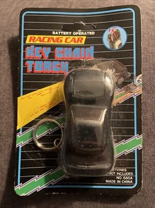 PORTACHIAVI AUTO GIOCATTOLO NERO VINTAGE ANNI '90 con TORCIA NASO NON APERTO ๐ - Foto 1 di 1