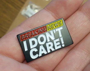 BREAKING NEWS - I DON'T CARE - funny enamel lapel pin badge brooch pinback flair - Picture 1 of 3
