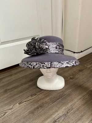 Women's Elegant Wide Brim Hat with Floral Accent - Image 1 of 4