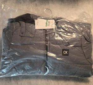 boys calvin klein puffer jacket size large 14/16 With Sleeve Logo - Picture 1 of 3
