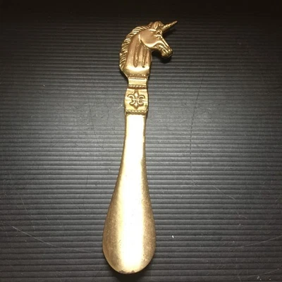 Vintage 70s Solid Brass Unicorn Shoehorn w/ A Fleur-de-lis Design 8.25"L x1.5"W - Image 1 of 4