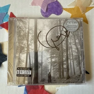 Taylor Swift SIGNED Heart Folklore CD Authentic Autograph New Sealed - Picture 1 of 3