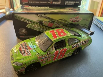 KYLE BUSCH 2009 #18 INTERSTATE BATTERIES TOYOTA 1/24 ACTION DIECAST - Image 1 of 3