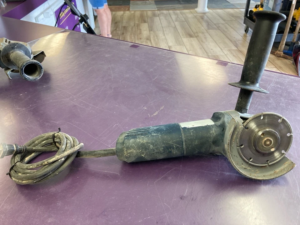 Amoladora angular compacta eléctrica con cable Bosch 1375a con mango Foto 1 de 1