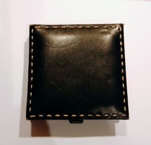 VINTAGE LEATHER TYPE POWDER COMPACT. 