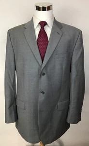 Tuta Calvin Klein grigia vestibilità classica 3 bottoni lana 44L 36x29 piatto davanti - Foto 1 di 12