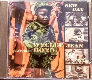 WYCLEF JEAN / BONO - NEW DAY - " CD-SINGLE " POP RADIO EDIT / HIP HOP EDIT " NEW - Picture 1 of 3