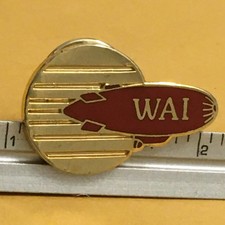 WAI Red Blimp Gold Circle Aviation Lapel Pin NOS