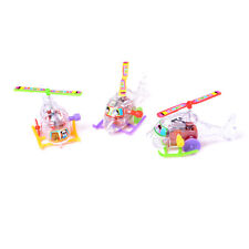 1x Mini Clockwork Transparent Aircraft Somersault Running Wind Up Toy..X