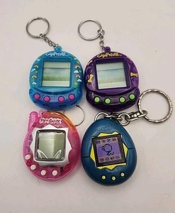 Giga Pet AR Electronics Pet Game Lot of 4Digital Doggie Horse Keychains - Picture 1 of 9