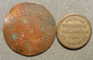 Amusement: Two tokens from Myrtle Beach SC 710SLS + St. Petersburg FL 880PIN. Br - Picture 1 of 2