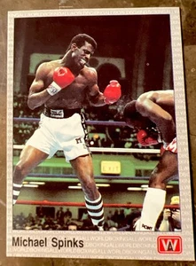 Tarjeta deportiva de boxeo 1991 Michael Spinks #23 AW de colección casi nueva/como nueva nítida 👊 - Imagen 1 de 2
